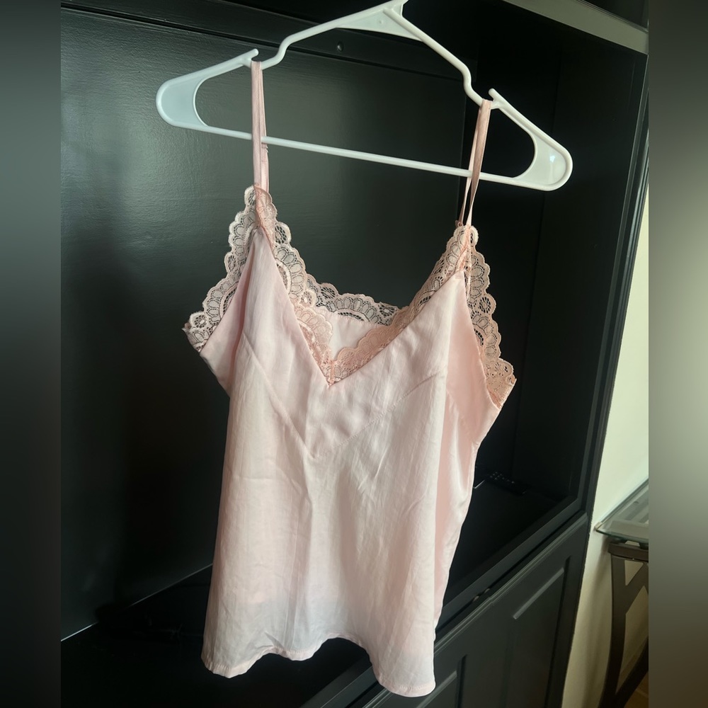 Light pink, vintage silky tank. Fits like a l/xl.